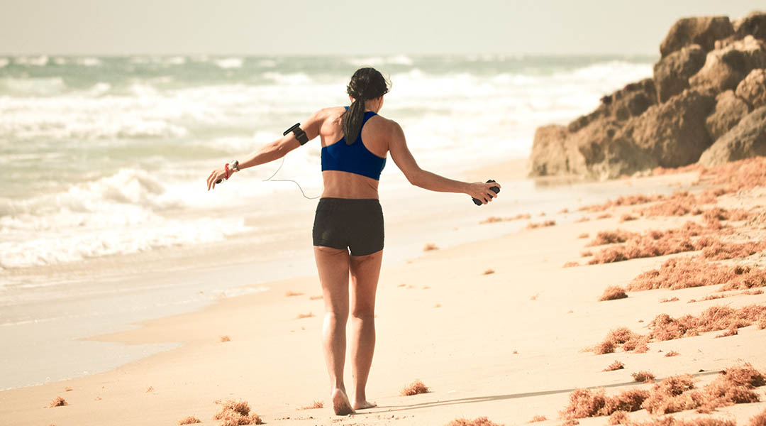 sport woman at the beach