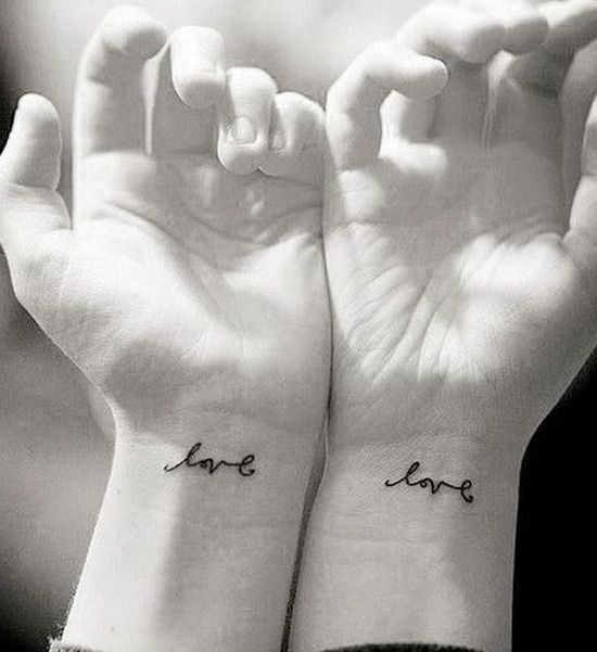 discreet love wrist tattoo