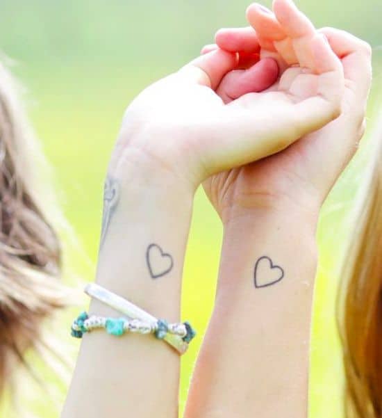 discreet heart wrist tattoos